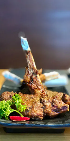 Marinated grilled lamb chops with fresh herbs at Moana Hawaiian BBQ Restaurant in Fairfield